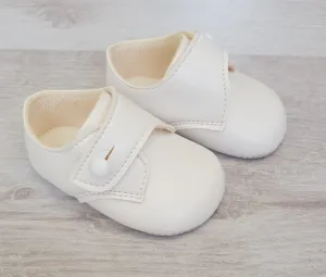 White matte button over soft sole shoes